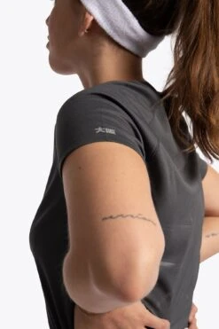 Osaka Women's Training Tee (Dark Grey) -Tennis Equipment Store training tee dark grey women detail 2000x2000.progressive 43faa4d0 67e3 41db 83bf 71f12640b129